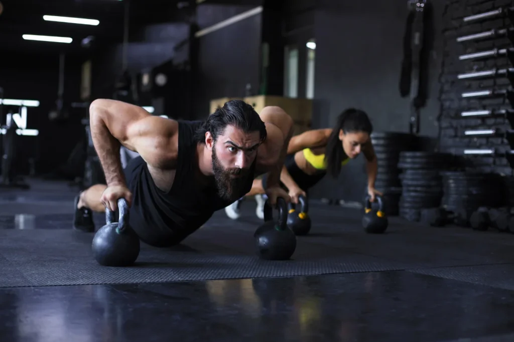 2 Guy and Girl working out together